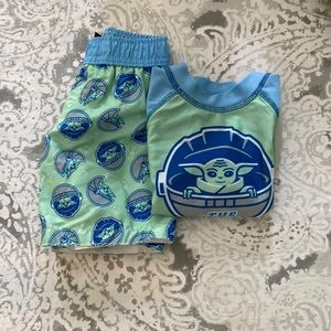Star Wars baby Yoda swim trunks and water shirt.